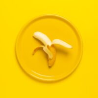 É melhor comer banana antes ou depois do treino?